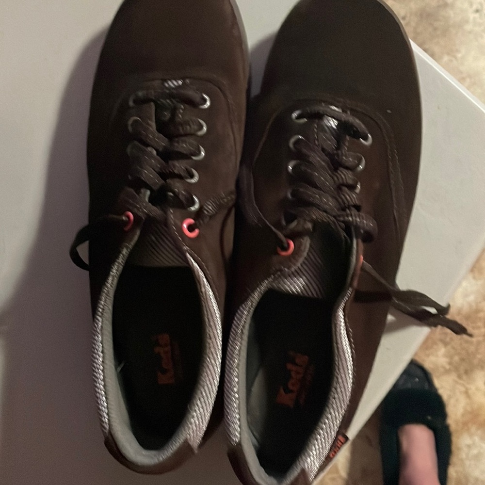 Keds brown suede lace up sneakers.